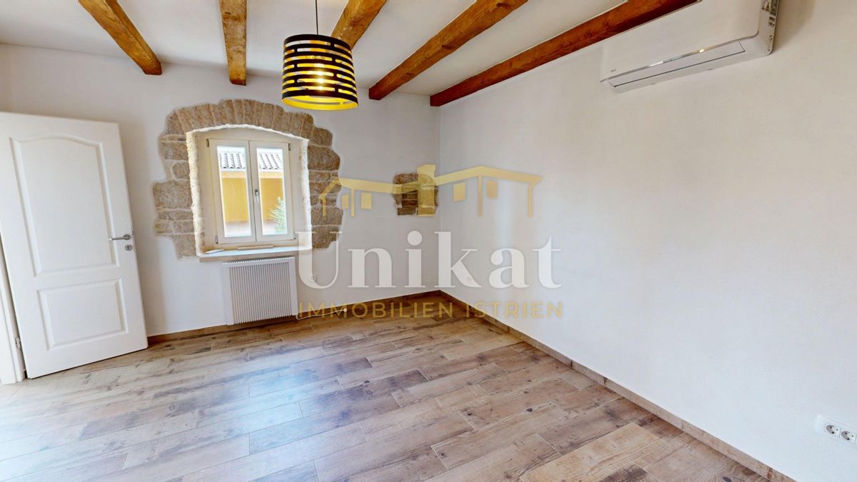 Dvojna hiša z garažo in velikim vrtom